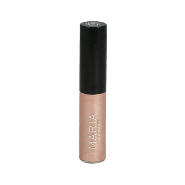 Maria Åkerberg lip gloss i genomskinlig förpackning med svart kork. Ljusbeige läppglans med pärlemorskimmer, 6 ml.