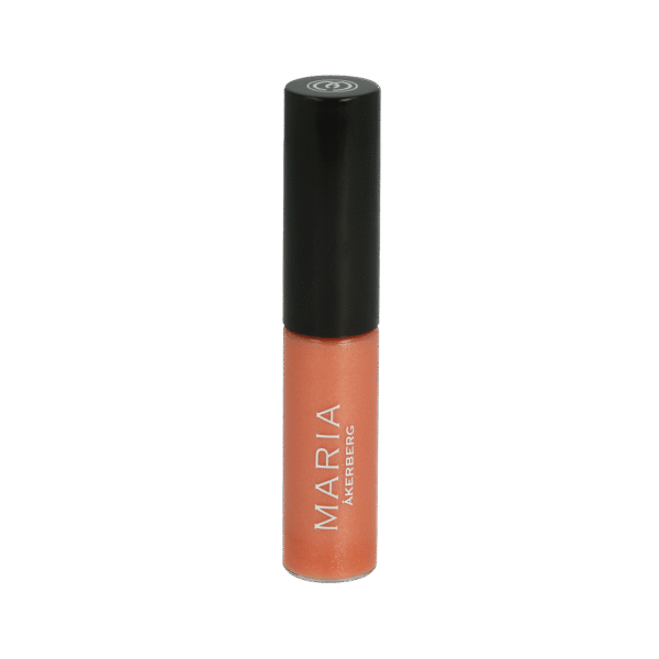 Maria Åkerberg lip gloss i genomskinlig förpackning med svart kork. Skimrande aprikosrosa läppglans, 6 ml.